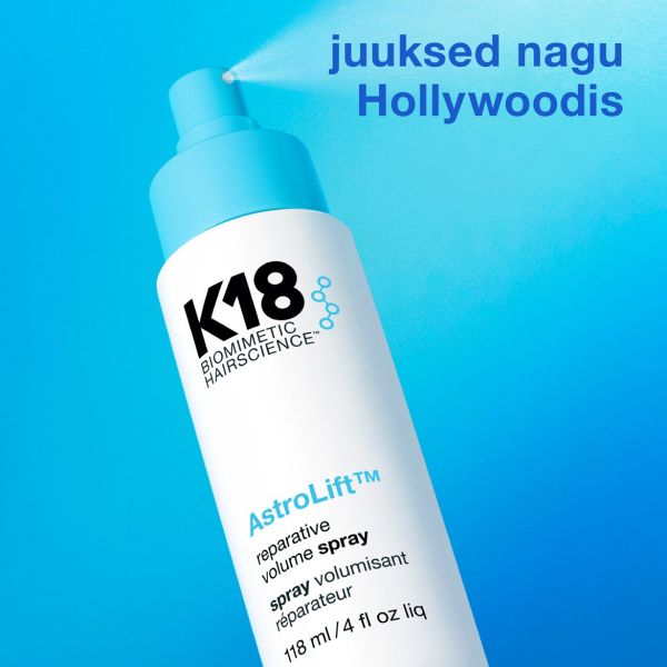 Valge pudel K18 AstroLifti taastavat volüümispreid siniste aktsentidega, mis lubab lisada volüümi ja parandada juukseid, gradientsinisel taustal.